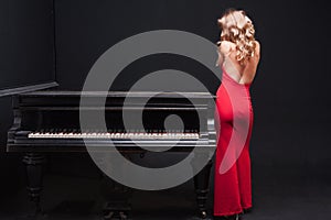 Woman and piano photo