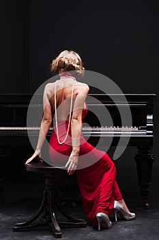 Woman and piano photo
