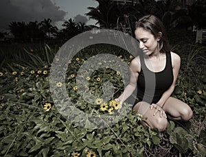 Woman picking flowers