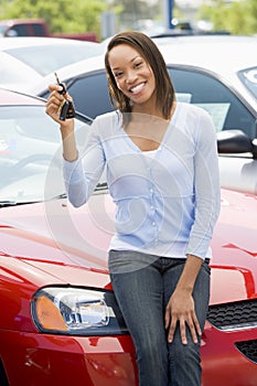 Woman picking up new car