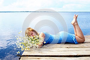 Woman on the pier lake