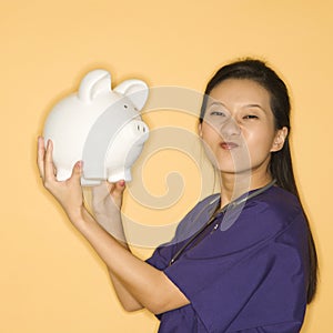 Woman and piggy bank. photo