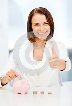 Woman with piggy bank and cash money