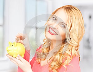 Woman with piggy bank and cash money