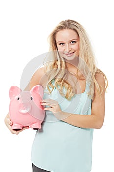 Woman, piggy bank and finance or happy in studio with cash investment, financial growth or portrait. Person, money box