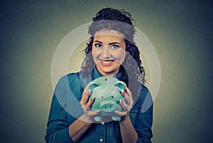 Woman with piggy bank