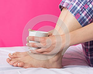 Woman in pijama having cup of coffee