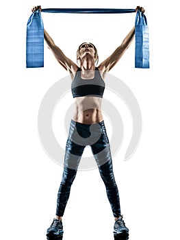 Woman pilates fitness elastic resistant band exercises silhouett