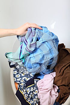 Woman Pile of dirty laundry washing