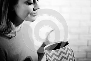 Woman with pile of presents at home