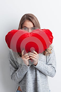 Woman with pillow heart