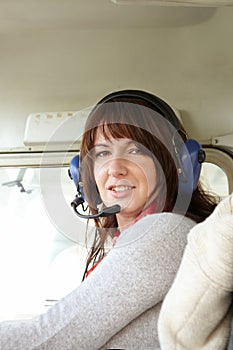 Woman pilot in plane