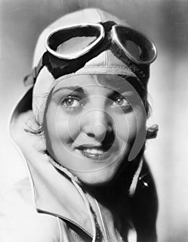 Woman with a pilots hat and goggles