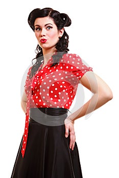 Woman pin-up make-up hairstyle posing in studio