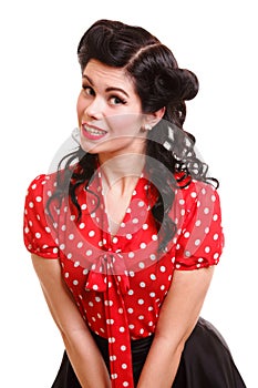 Woman pin-up make-up hairstyle posing in studio