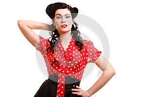 Woman pin-up make-up hairstyle posing in studio