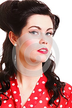 Woman pin-up make-up hairstyle posing in studio