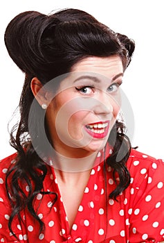 Woman pin-up make-up hairstyle posing in studio