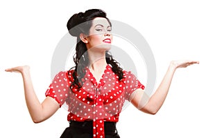 Woman pin-up make-up hairstyle posing in studio