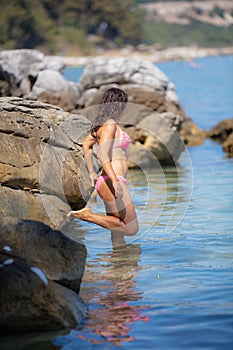 Woman in pink bikini