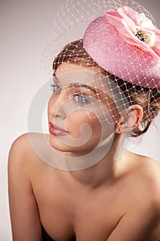 Woman in pink bonnet with voile photo