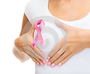 Woman with pink cancer awareness ribbon