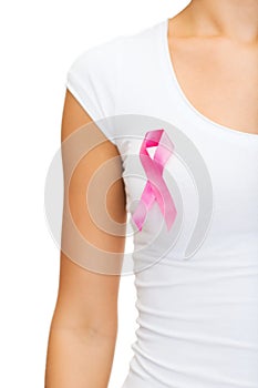 Woman with pink cancer awareness ribbon