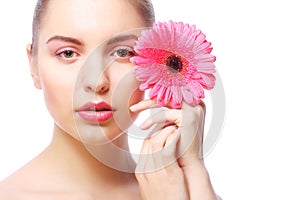 Woman with pink gerber flower