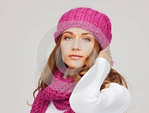 Woman in pink hat and scarf