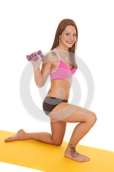 Woman pink pra fitness mat kneel smile