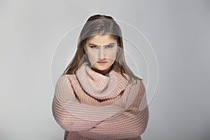 Woman in Pink Sweater Looking Angry