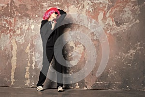 Woman in pink wig hair wear sport suit full length