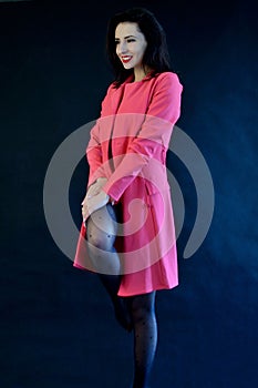 Woman in pinky coat
