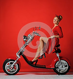 Woman pinup style ride new electric car motorcycle bicycle scooter present for new year 2019