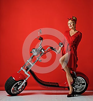 Woman pinup style ride new electric car motorcycle bicycle scooter present for new year 2019