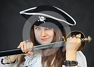 Woman - pirate getting sabre from a sheath