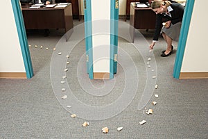 Woman placing trail of bread