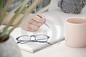 Woman planning the week ahead.