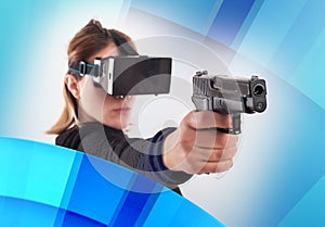 Woman play VR shooter game with virtual reality gun and vr glass