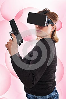 Woman play VR shooter game with virtual reality gun and vr glass