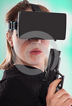 Woman play VR shooter game with virtual reality gun and vr glass