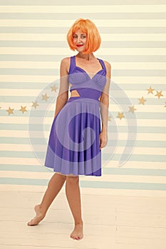 Woman playful mood having fun. Fun and entertainment. Girl bob wig posing striped background of studio. Create your own