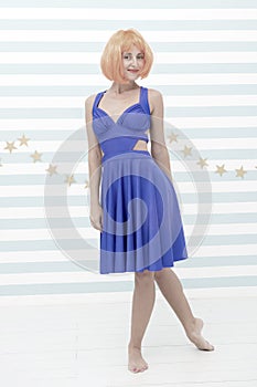 Woman playful mood having fun. Fun and entertainment. Girl bob wig posing striped background of studio. Create your own