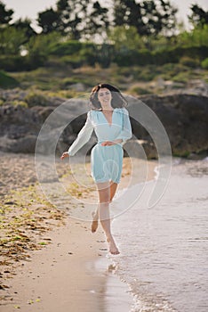 Brunette young woman posing in sensual clothes