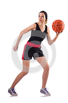 The woman playing basketball isolated on white