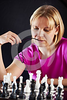 Woman playing chess