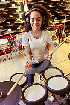 Woman playing electronic drums