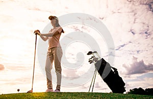 Woman playing golf