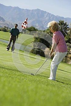 Woman Playing Golf