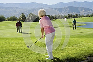 Woman Playing Golf